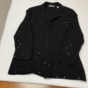 Kate Hill, black cardigan with embellishments.